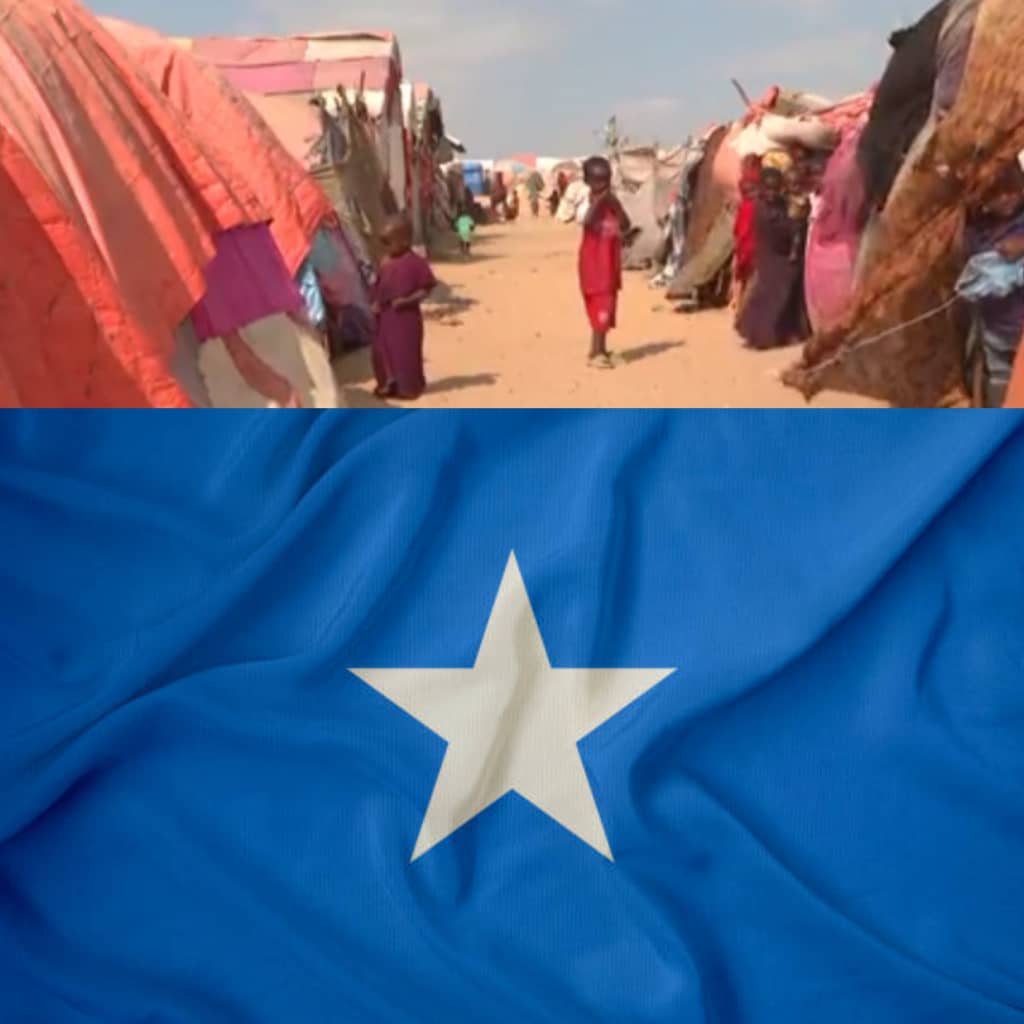 صورة من خيام النازحين من الجفاف مع علم الصومال