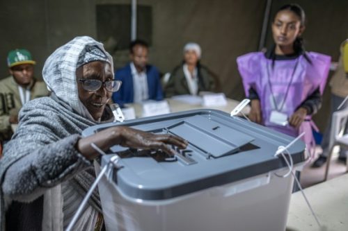 An elderly Ethiopian woman exercises her right to vote
